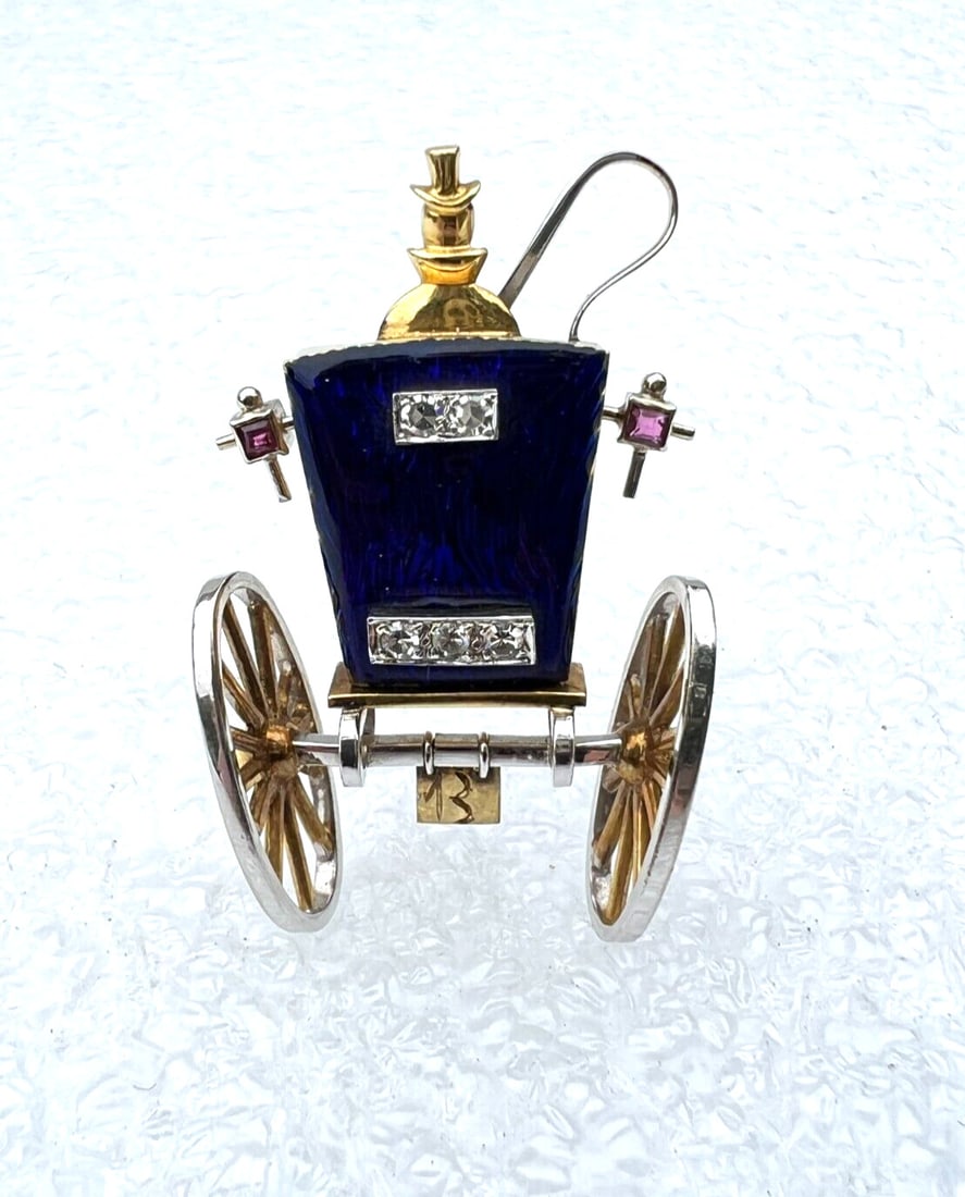 Corletti 18K Gold Diamond Ruby Enamel Carriage Brooch: Corletti 18K Gold Diamond Ruby Enamel Carriage Brooch This exquisite Italian carriage brooch showcases the artistry of Corletto, crafted from 18K yellow and white gold with vibrant enamel. Adorned wit
