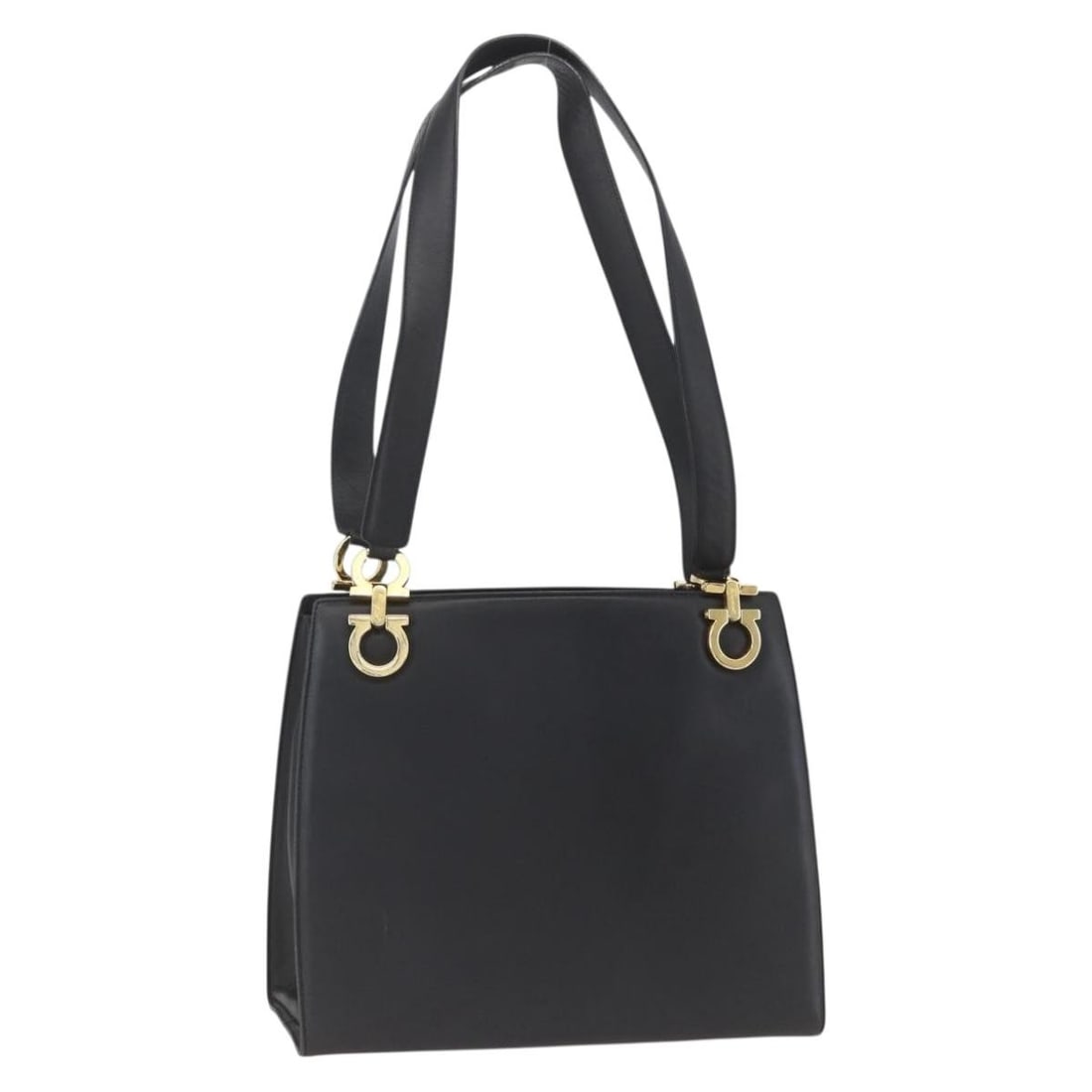 Black Leather Gancini Shoulder Bag by Salvatore Ferragamo with Gold Accents: Black Leather Gancini Shoulder Bag by Salvatore Ferragamo with Gold Accents This Salvatore Ferragamo Gancini shoulder bag features a classic black leather exterior with gold-tone accents. Designed for