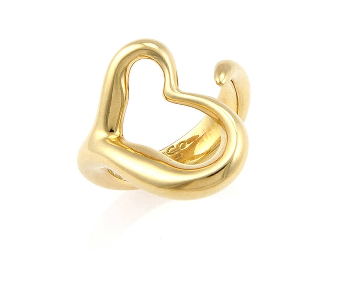 18k Yellow Gold Curved Ring Tiffany Co Elsa Peretti Open Heart Size 5: 18k Yellow Gold Curved Ring Tiffany Co Elsa Peretti Open Heart Size 5 This Elsa Peretti Open Heart curved ring is crafted in 18k yellow gold and features the iconic Open Heart motif with a graceful cu