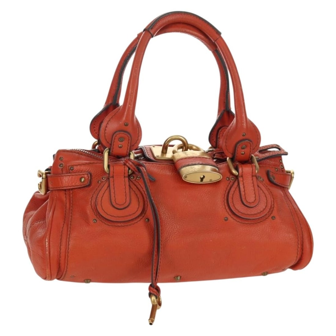 Chloe Paddington Orange Leather Satchel with Silver and Gold Accents: Chloe Paddington Orange Leather Satchel with Silver and Gold Accents This Chloe Paddington handbag is crafted from leather in a striking combination of orange, silver, and gold tones. Designed for wom