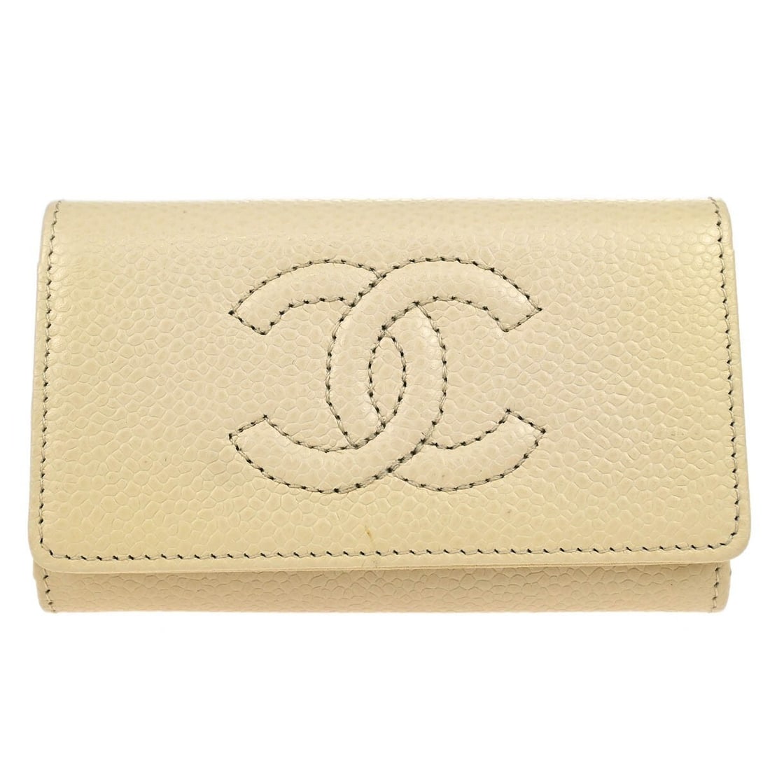CHANEL Six Hook Key Case White Leather France: CHANEL Six Hook Key Case White Leather France Vintage Chanel six-hook key case in white caviar skin leather with a button logo accent. The interior includes two pockets, and the piece comes with a ser