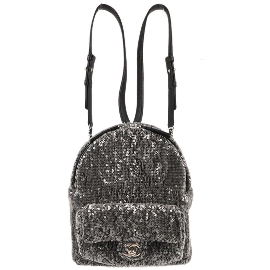 CHANEL Gray Sequin Leather Backpack with Logo Accents: CHANEL Gray Sequin Leather Backpack with Logo Accents Chanel gray sequins backpack with leather exterior and leather lining. It features a logo accent, pockets, and a medium size suitable for casual w