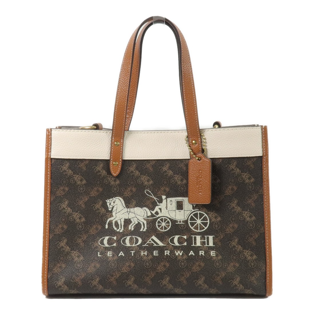 COACH C8458 Field Tote Handbag PVC Coated Canvas Brown White: COACH C8458 Field Tote Handbag PVC Coated Canvas Brown White A COACH Field Tote Bag handbag in brown and white, made from PVC coated canvas. It features a magnetic pocket and one inside zip pocket. Th