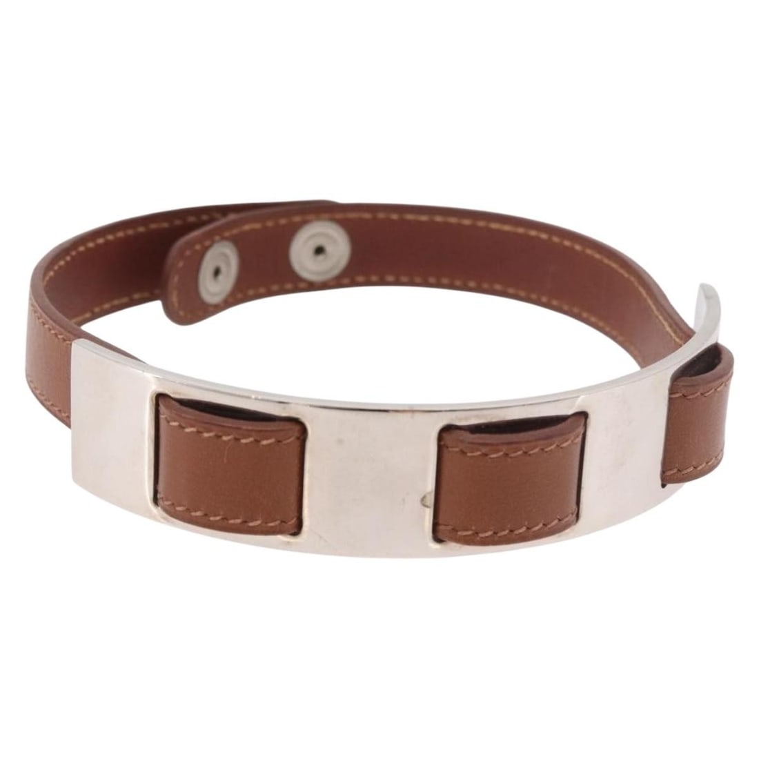 Hermes brown leather bracelet with silver tone hardware: Hermes brown leather bracelet with silver tone hardware Hermes brown leather bracelet with silver-tone hardware, made in France. This women's armlet shows reasonable wear and tear, including slight ru