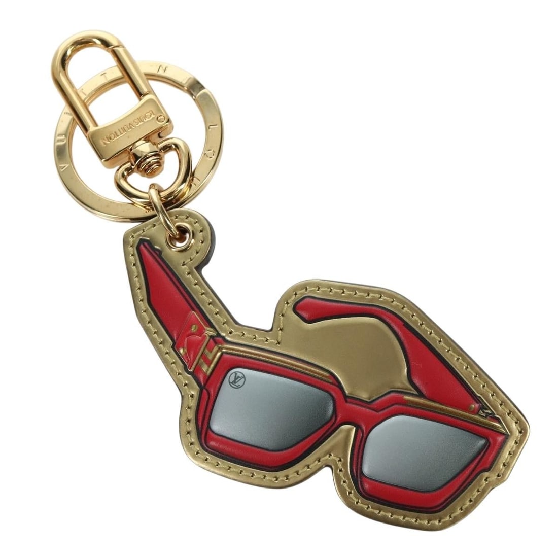 Monogram Canvas Millionaire Bag Charm Gold M68865 by Louis Vuitton: Monogram Canvas Millionaire Bag Charm Gold M68865 by Louis Vuitton This Louis Vuitton Monogram Millionaire Charm is crafted from monogram canvas in a gold colorway. Designed for women, it features sli