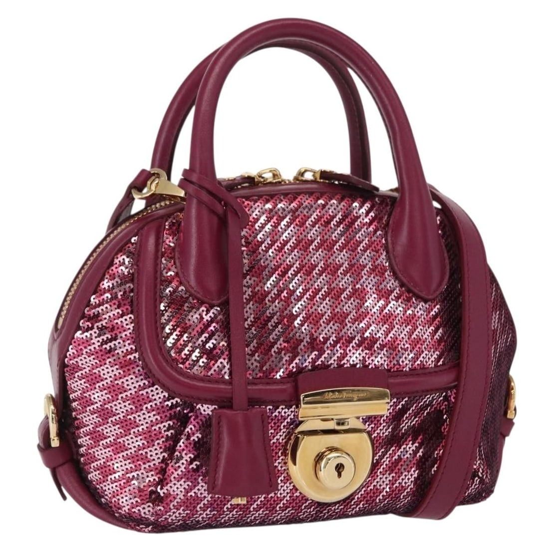 Salvatore Ferragamo Gancini 2 Way Leather Hand Bag Pink Gold: Salvatore Ferragamo Gancini 2 Way Leather Hand Bag Pink Gold Salvatore Ferragamo Gancini sequin bag in pink and gold leather, presented as a 2-way handbag. It comes with a dust bag and shoulder strap,