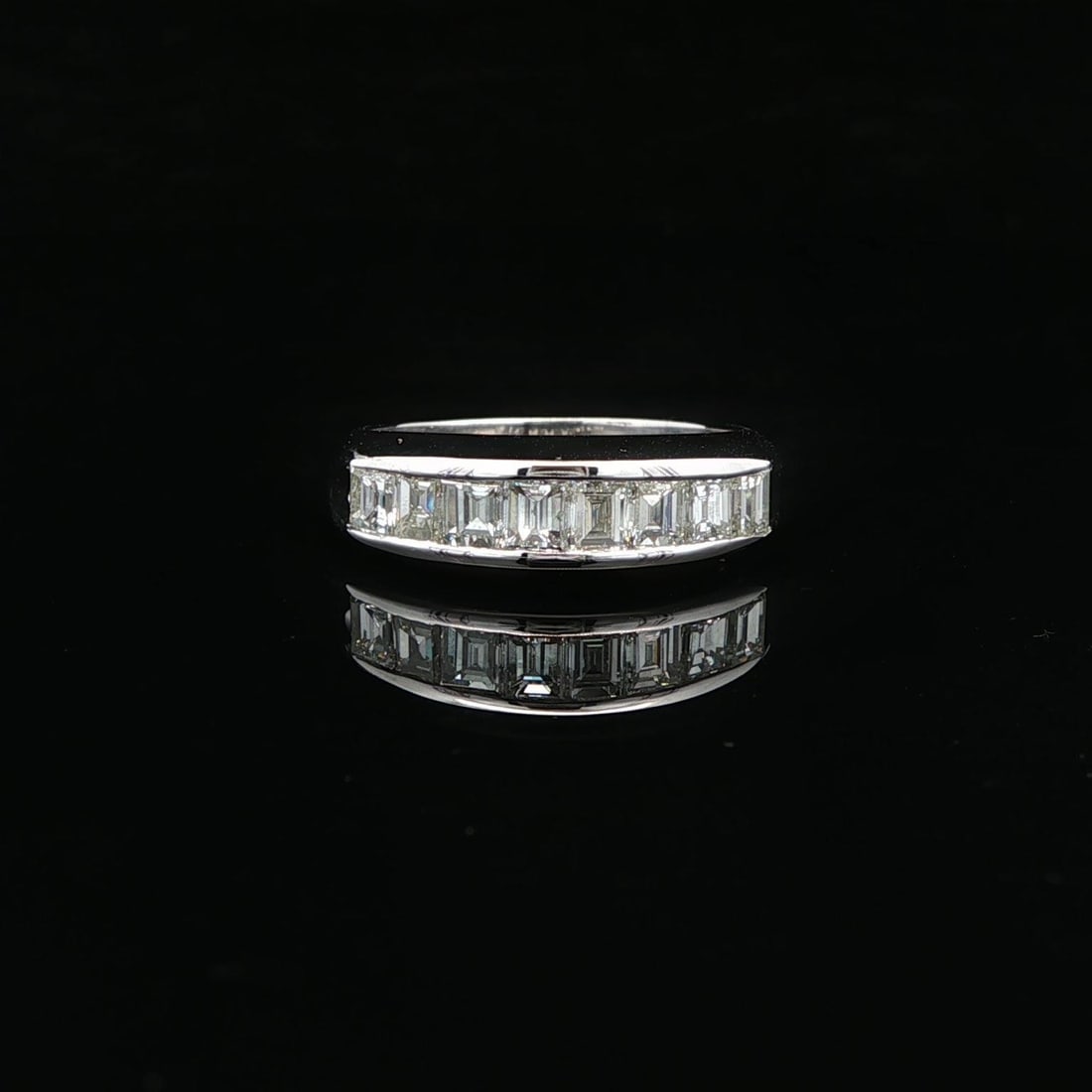 Platinum Channel Set 1.04ctw Square Diamond Band Ring Size 5.5: Platinum Channel Set 1.04ctw Square Diamond Band Ring Size 5.5 This exquisite channel set band ring features a stunning arrangement of eight square step cut natural diamonds, totaling 1.04 carats. The
