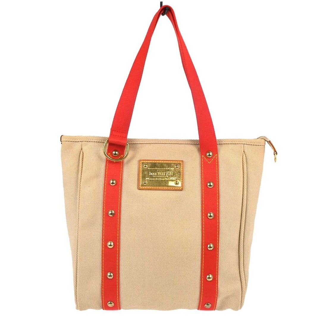 Louis Vuitton Antigua Cabas MM Canvas Tote Beige M40035: Louis Vuitton Antigua Cabas MM Canvas Tote Beige M40035 Vintage Louis Vuitton Antigua Cabas MM tote bag in beige canvas with red double handles and a zip closure. The bag features a red lining, one in