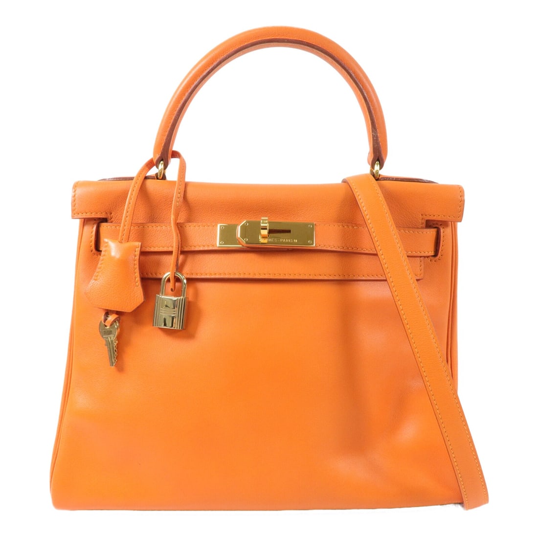 Hermes Kelly 28 Orange Calfskin 2 Way Shoulder Bag France: Hermes Kelly 28 Orange Calfskin 2 Way Shoulder Bag France Hermes Kelly 28 2 Way Shoulder Bag in orange poppy/orange H, made from Vaux Swift leather and calfskin (cowhide). This women's regular-size ba