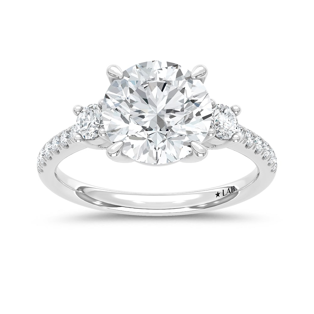 14K White Gold Lab Grown Diamond 2 3/8 Ct.Tw. Round Shape Engagement Ring (IGI Certified Center 3ct): 14K White Gold Lab Grown Diamond 2 3/8 Ct.Tw. Round Shape Engagement Ring (IGI Certified Center 3ct) Shine brilliantly with this exquisite 14K white gold engagement ring, featuring a stunning 3-carat 