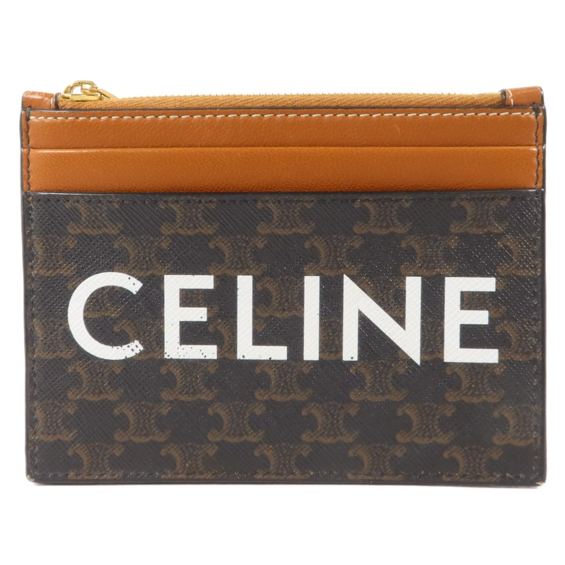 CELINE Brown Coated Canvas Zip Card Case GHW: CELINE Brown Coated Canvas Zip Card Case GHW A CELINE women's zipped card holder in brown PVC coated canvas. It features a regular size, brown frame color, and a practical card case design with two op