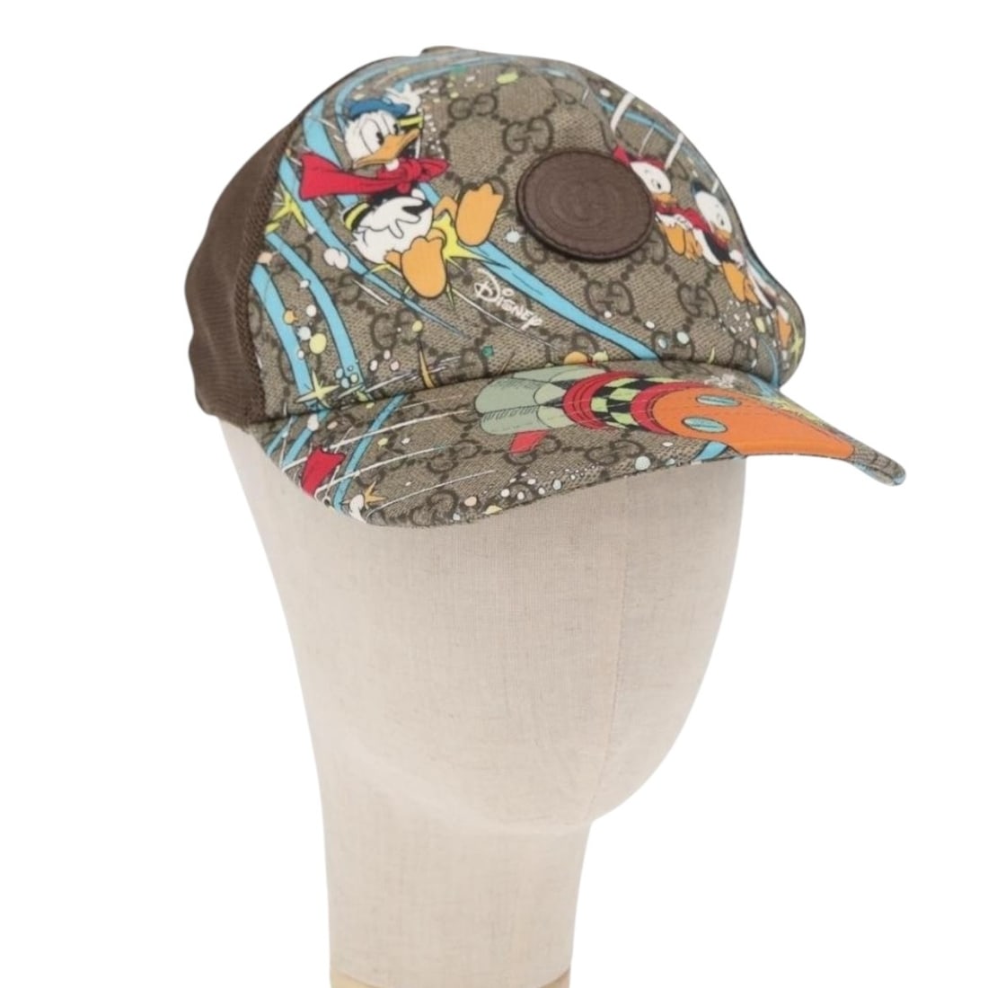 Gucci Disney GG Supreme beige PVC leather cap 648843 dust bag: Gucci Disney GG Supreme beige PVC leather cap 648843 dust bag This GUCCI GG Supreme cap from the GUCCIxDisney collaboration features a beige PVC leather and GG canvas exterior. Designed for women, thi