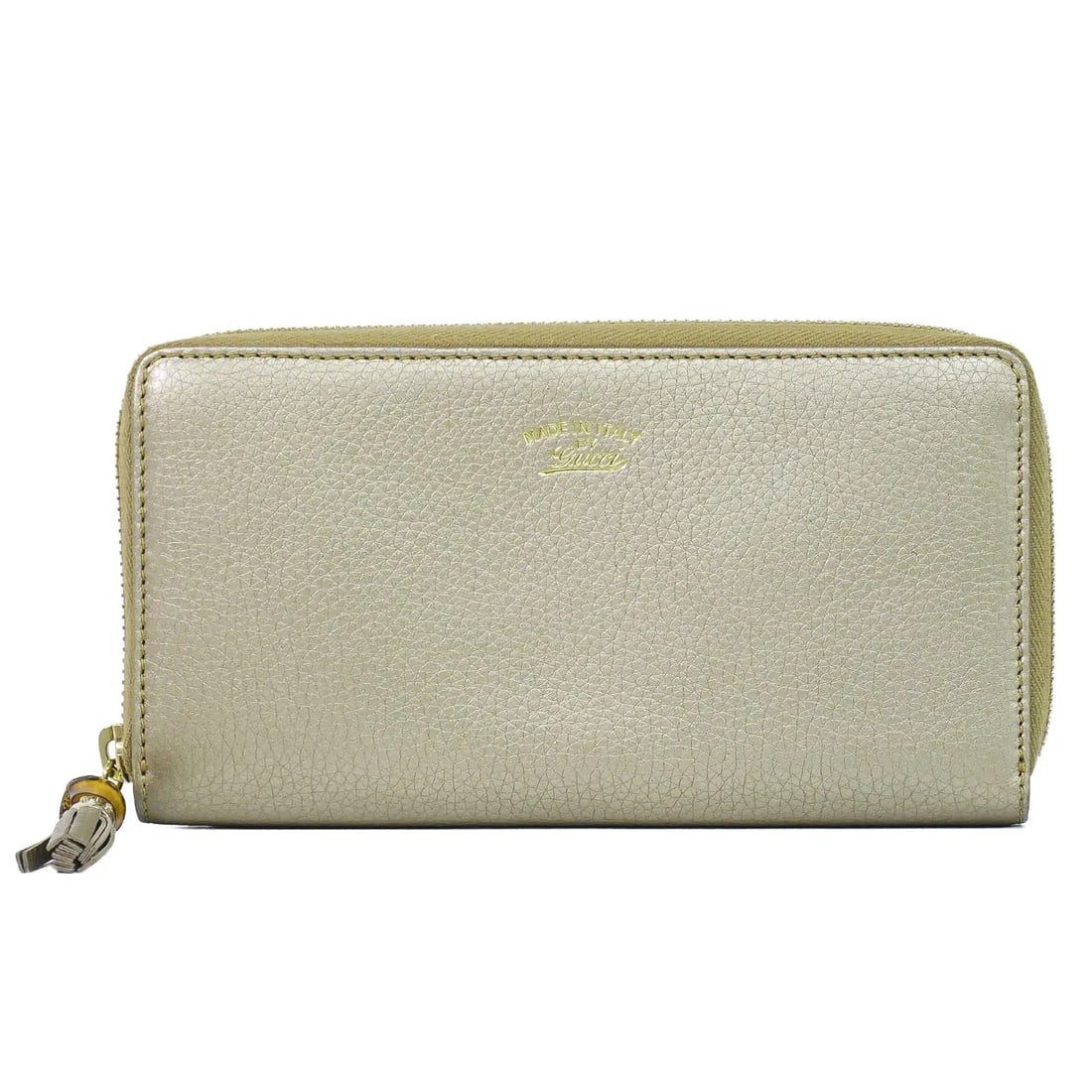Gucci Bamboo Tassel Zip Leather Wallet Gold: Gucci Bamboo Tassel Zip Leather Wallet Gold Gucci Bamboo Tassel Zip wallet in gold leather with a slim profile and good overall condition. It shows slight wear from normal use, with very slight scuffi