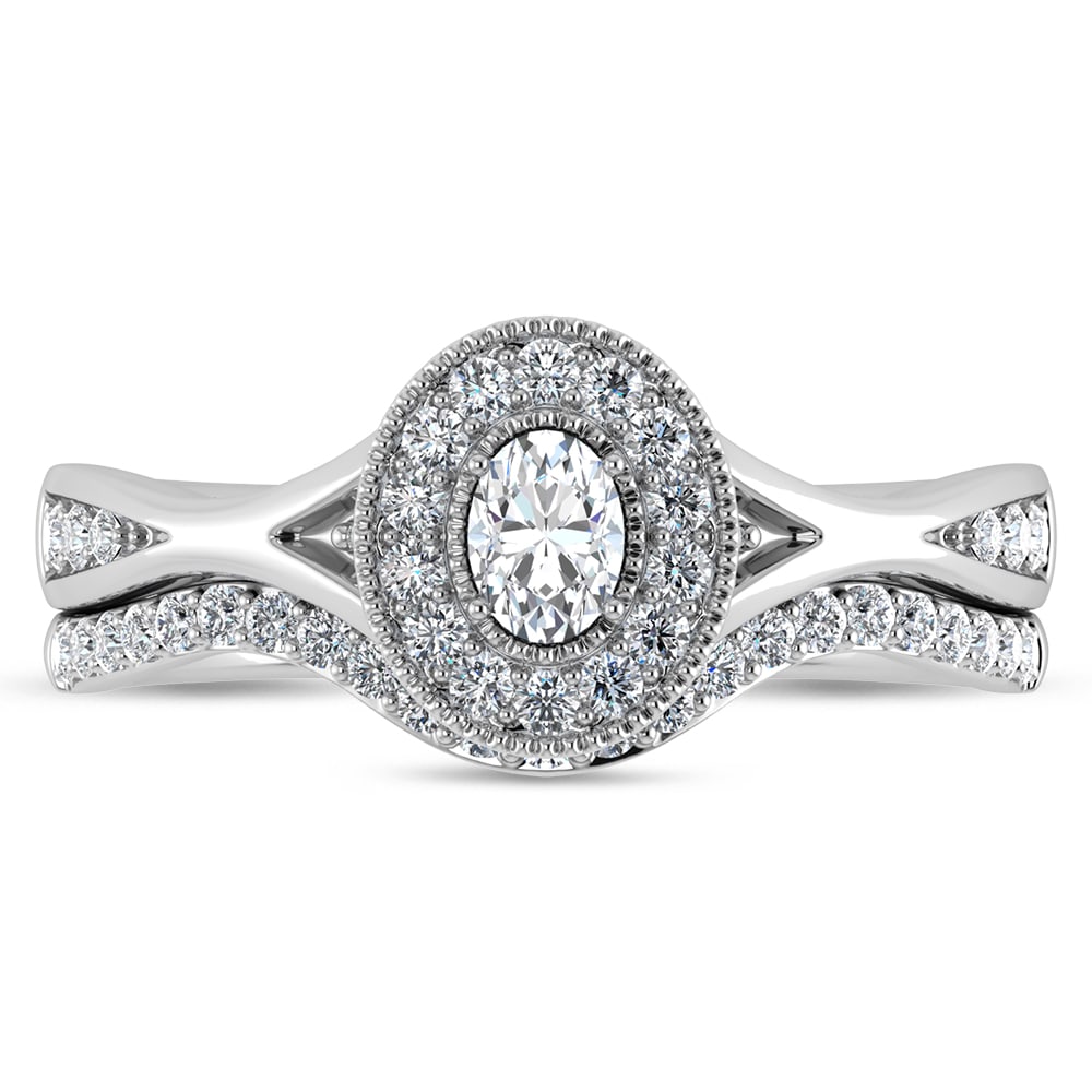 Diamond 1/2 Ct.Tw. Oval Cut Bridal Ring in 14K White Gold: Diamond 1/2 Ct.Tw. Oval Cut Bridal Ring in 14K White Gold 14k White Gold Stone Color: G-h Stone Clarity: Si2 Each ring is presented in standard size 6.5. Complimentary resizing is available between si