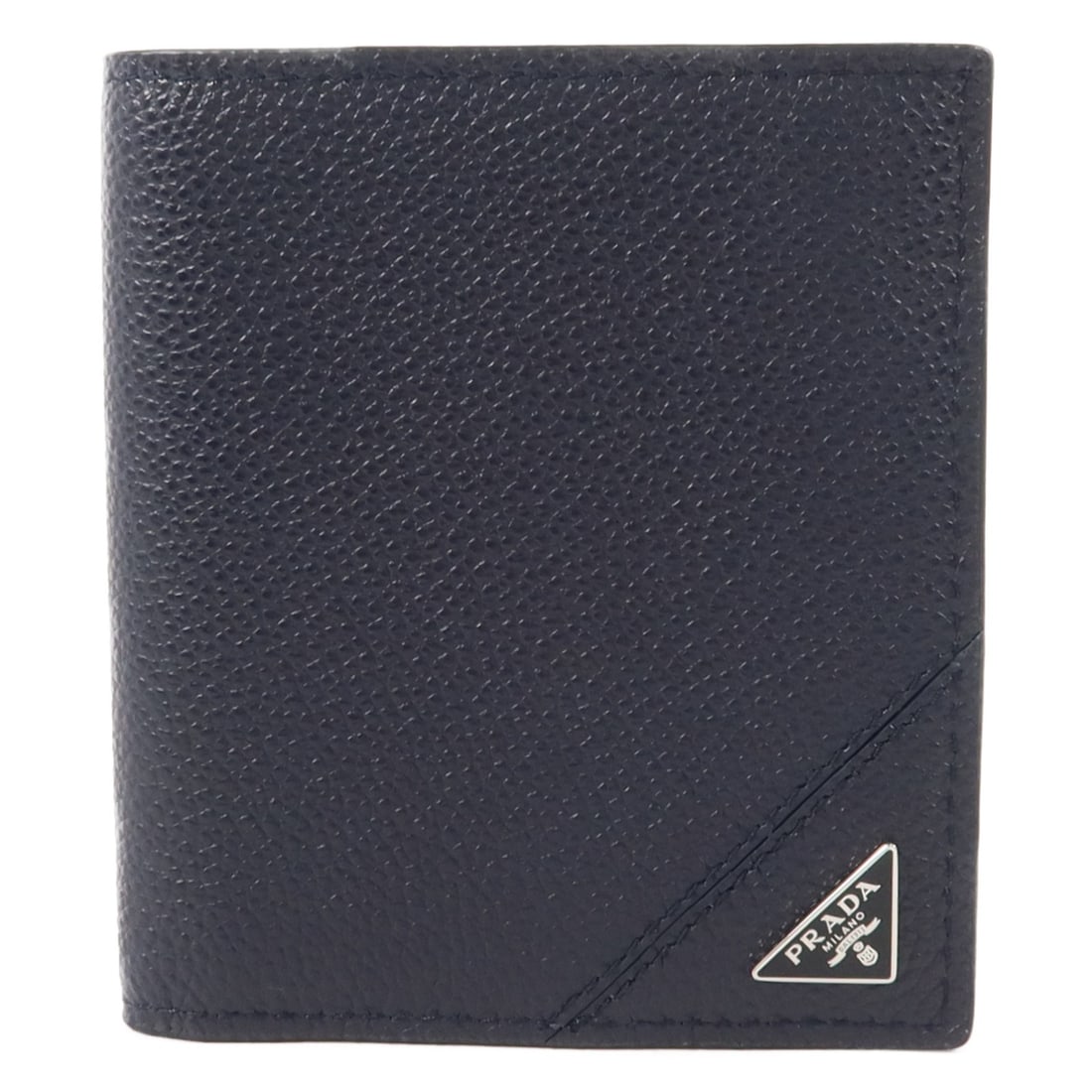 PRADA 2MO004 bifold wallet in navy calfskin: PRADA 2MO004 bifold wallet in navy calfskin Prada bifold wallet in saffiano leather with a navy blue colorway. It is identified as model 2MO004 and is made from calfskin (cowhide). The wallet includes