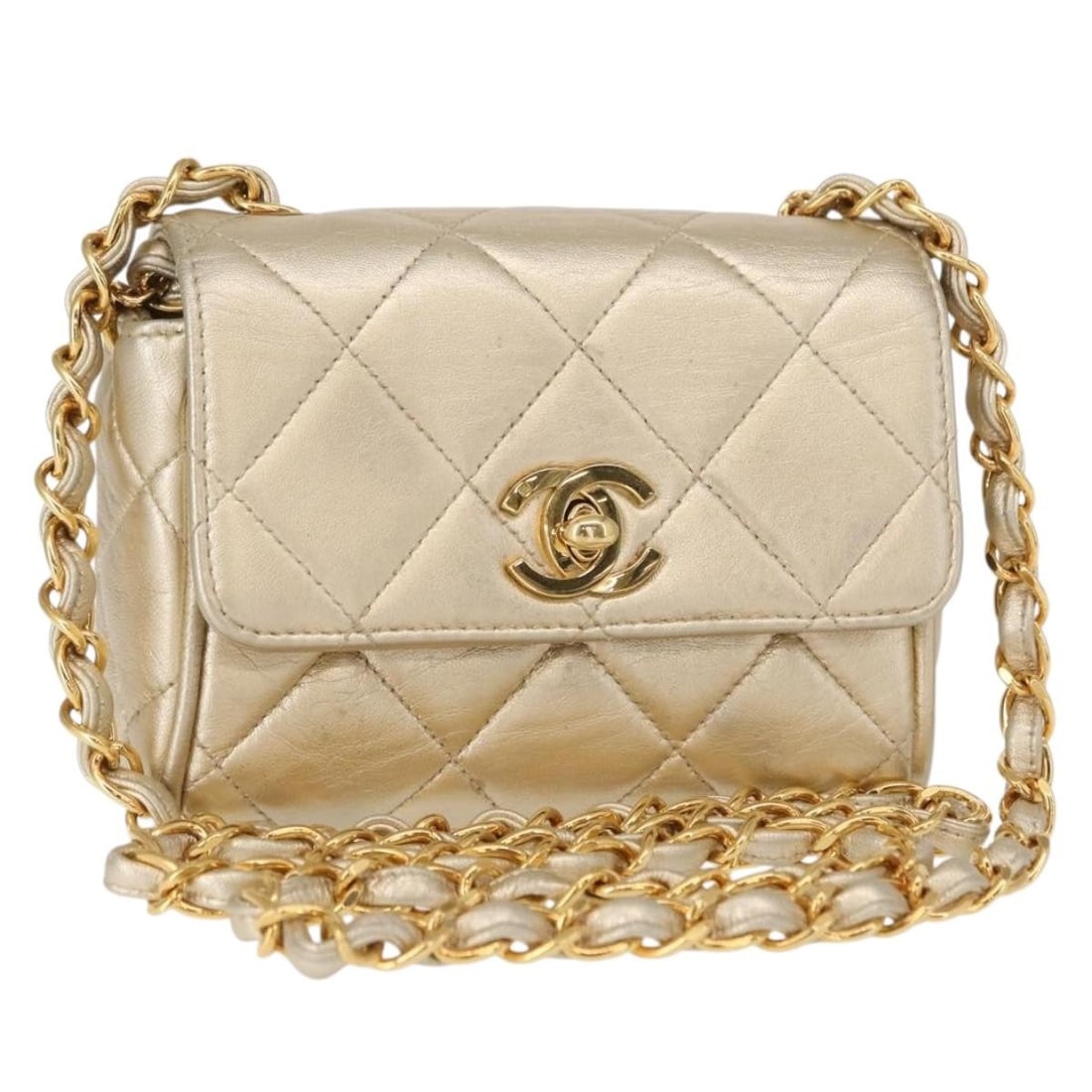 CHANEL Mini Matelasse Gold Leather Shoulder Bag with Auth Card: CHANEL Mini Matelasse Gold Leather Shoulder Bag with Auth Card This CHANEL Mini Matelasse 13 Chain Shoulder Bag is a luxurious accessory crafted from high-quality leather in a stunning gold hue. The b
