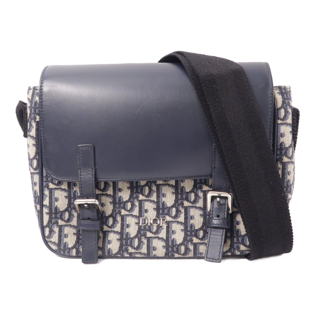 Dior M9994P7VY Kids Messenger Shoulder Bag Oblique Canvas Navy: Dior M9994P7VY Kids Messenger Shoulder Bag Oblique Canvas Navy Christian Dior kids' messenger shoulder bag in navy Oblique canvas. It features a shoulder strap with an adjustable drop, a magnetic pock