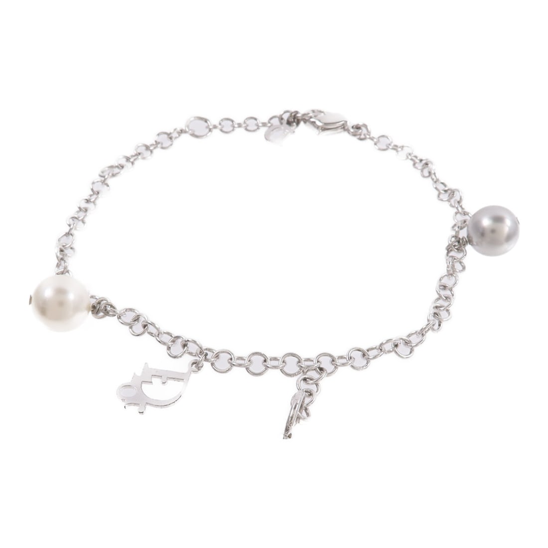 Dior CD Clear White Silver Tone Bracelet Plastic Metal: Dior CD Clear White Silver Tone Bracelet Plastic Metal Christian Dior CD SHW Bracelet in clear, white, and silver tones. It is made of plastic and metal, and comes with a storage box and storage bags.