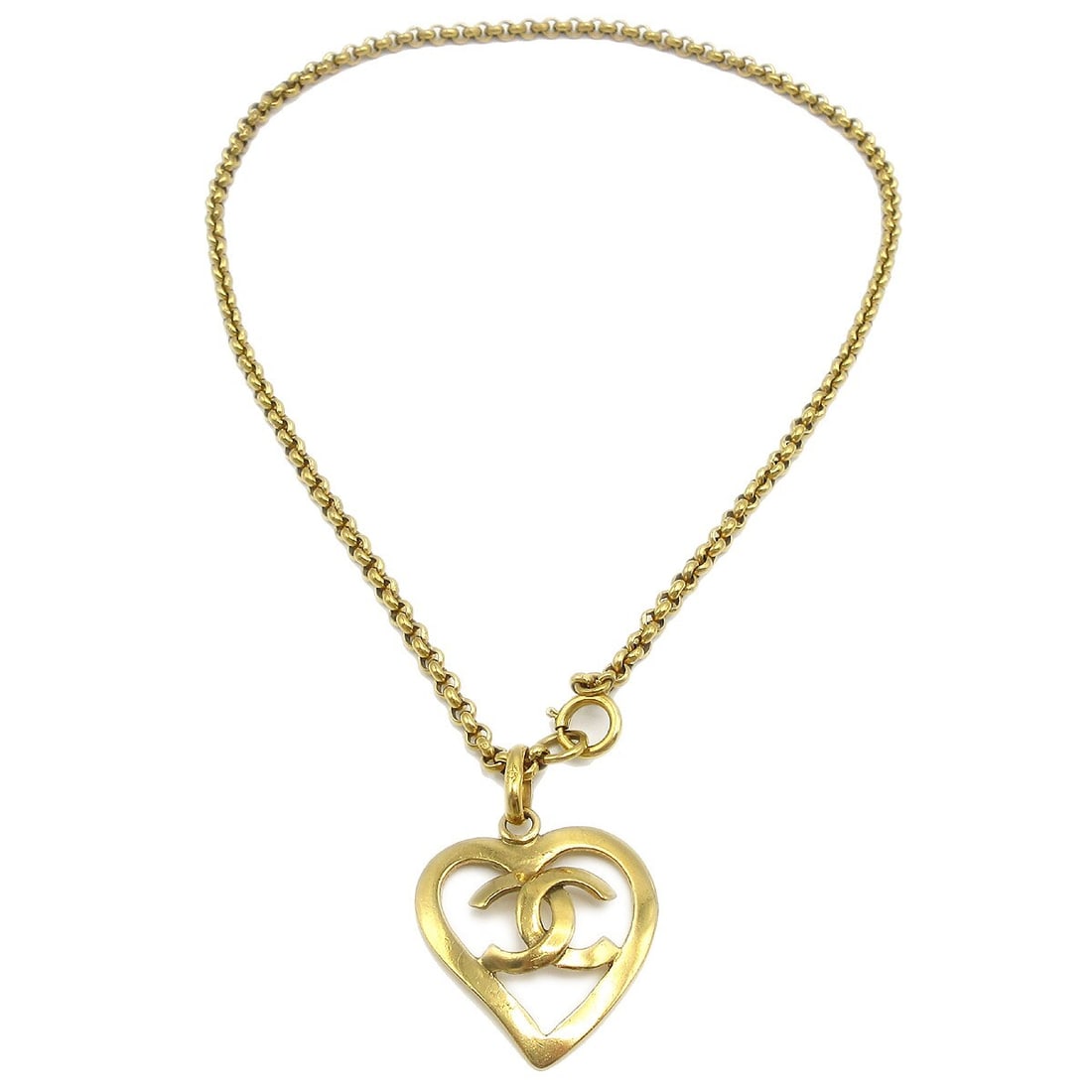 Vintage Chanel 95P Gold Plated Heart Charm Pendant Necklace: Vintage Chanel 95P Gold Plated Heart Charm Pendant Necklace Vintage Chanel necklace with a heart charm pendant in gold-plated metal. Made in France, it features a chain overall length of 23.6 inches a
