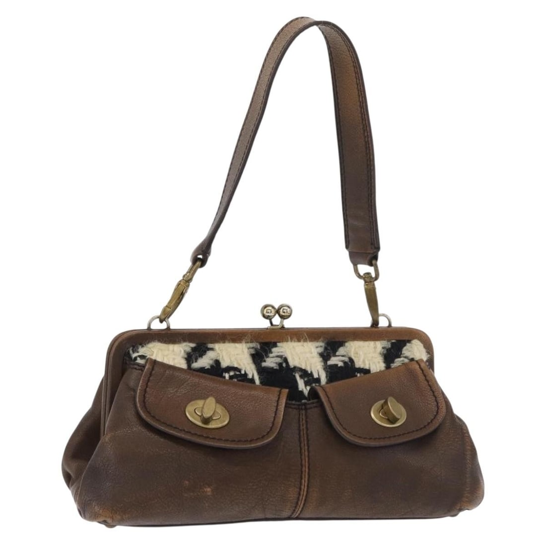 Miu Miu Brown Leather Handbag with Dust Bag Made in Italy: Miu Miu Brown Leather Handbag with Dust Bag Made in Italy A Miu Miu leather hand bag in brown and silver, made in Italy. It comes with a dust bag and shows reasonable wear and tear, including surface 