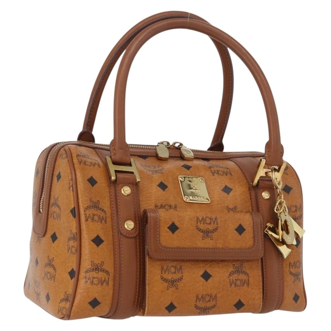 MCM Vicetos Brown Gold PVC Boston Bag Charm Korea: MCM Vicetos Brown Gold PVC Boston Bag Charm Korea This MCM Vicetos Mini Logogram Boston Bag features a classic Boston silhouette crafted from durable PVC leather in a brown and gold color scheme. Desi