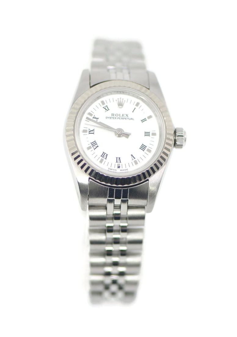 Rolex Oyster Perpetual 76094 Stainless Steel Watch with Box: Rolex Oyster Perpetual 76094 Stainless Steel Watch with Box Explore the elegance of this pre-owned Rolex Oyster Perpetual wristwatch, model number 76094. Crafted with meticulous attention to detail, t