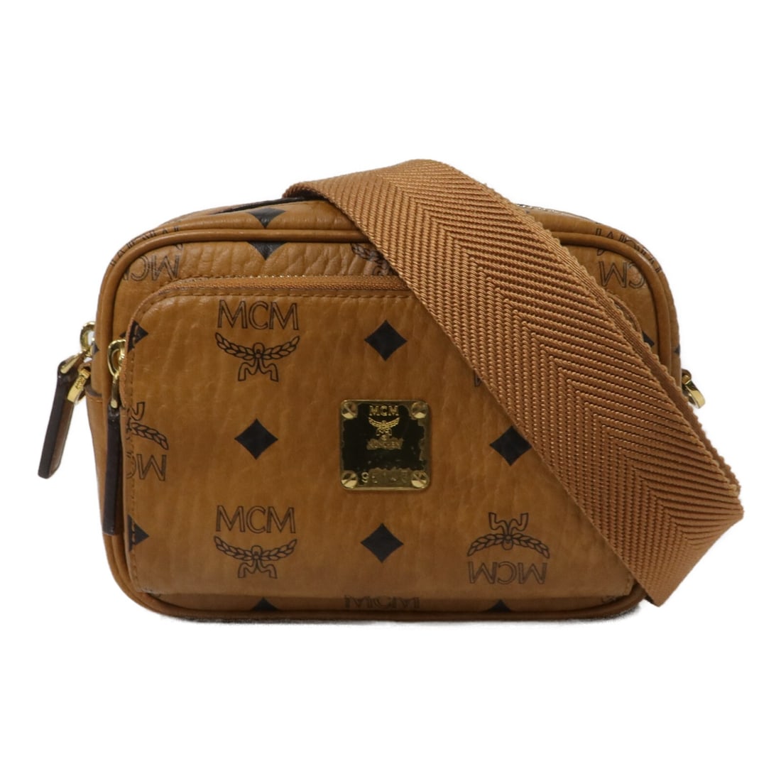 MCM MMRAAKC03CO001 Aren Visetos X Mini Crossbody Bag Beige Cognac: MCM MMRAAKC03CO001 Aren Visetos X Mini Crossbody Bag Beige Cognac MCM Visetos Aren Crossbody X-Mini Shoulder Bag in BeigexCognac. It is made of PVC coated canvas and comes with a shoulder strap. The b