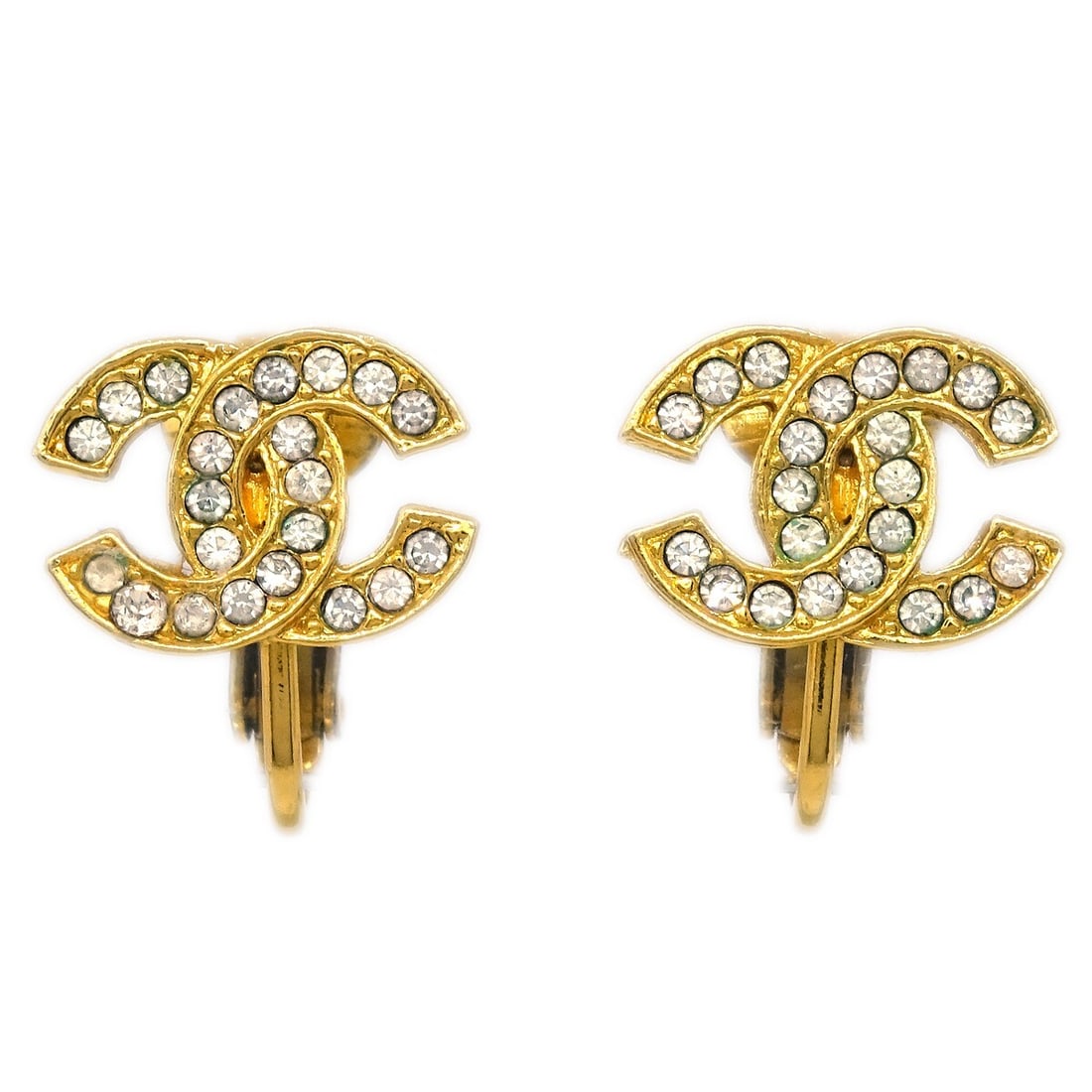 CHANEL CC Clip On Earrings Gold Plated Rhinestone Logo: CHANEL CC Clip On Earrings Gold Plated Rhinestone Logo Chanel clip-on earrings featuring the iconic CC logo design in gold plated metal with rhinestone accents. Made in France, this pair presents in v
