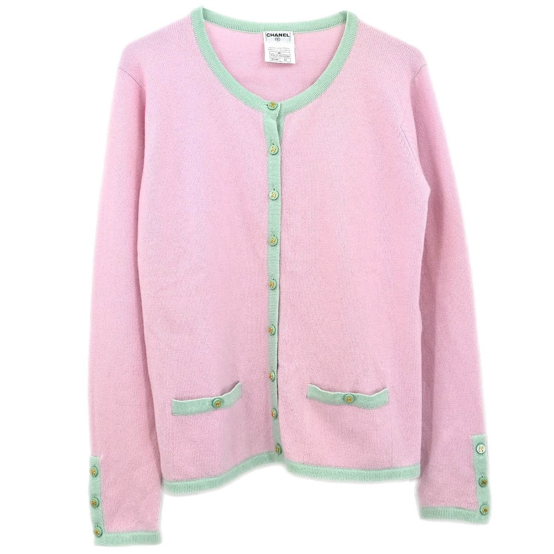 CHANEL 96C Pink Cashmere Knit Cardigan Womens 42: CHANEL 96C Pink Cashmere Knit Cardigan Womens 42 Vintage Chanel pink cardigan in 100% cashmere knit with a regular fit, long sleeves, and button logo accents. This women's cardigan features two exteri