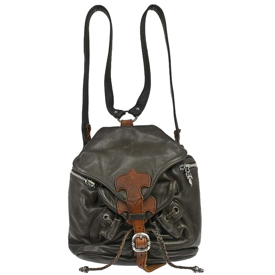 Chrome Hearts Flerknee Leather Backpack in Brown: Chrome Hearts Flerknee Leather Backpack in Brown Chrome Hearts Flerknee brown leather backpack in medium size, designed for casual wear. It features a shoulder strap, logo accent, and multiple pockets