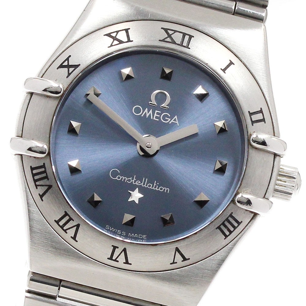 Omega Constellation Mini 1562.81 Blue Dial Quartz Ladies Watch: Omega Constellation Mini 1562.81 Blue Dial Quartz Ladies Watch This OMEGA Constellation Mini women's wristwatch features a stainless steel case and bracelet, complemented by a blue dial. The watch ope
