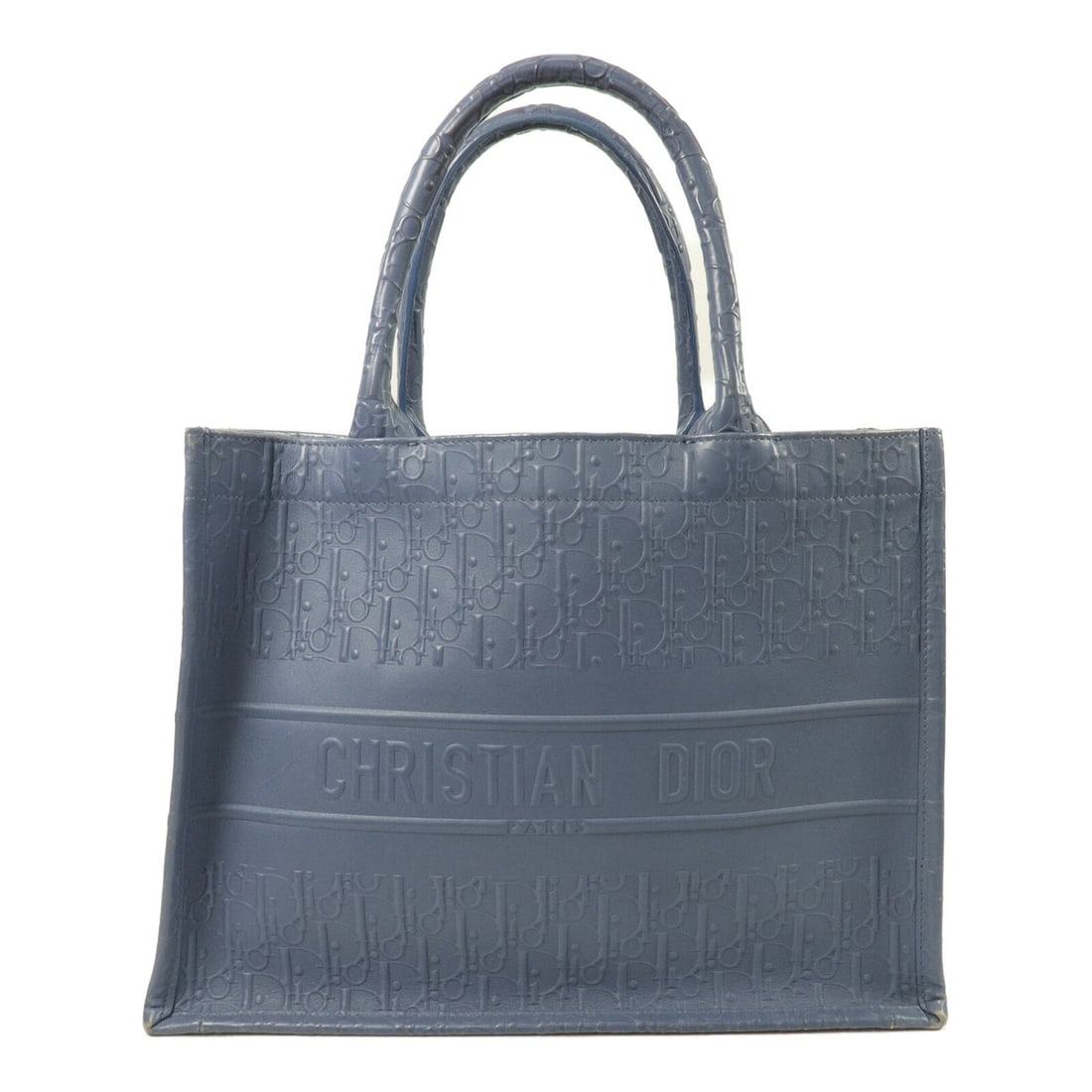 Blue Calfskin Medium Tote Christian Dior Book Tote: Blue Calfskin Medium Tote Christian Dior Book Tote Christian Dior Book Tote medium tote bag in blue calfskin leather. The bag comes with storage bags and shows reasonable wear and tear, with date code