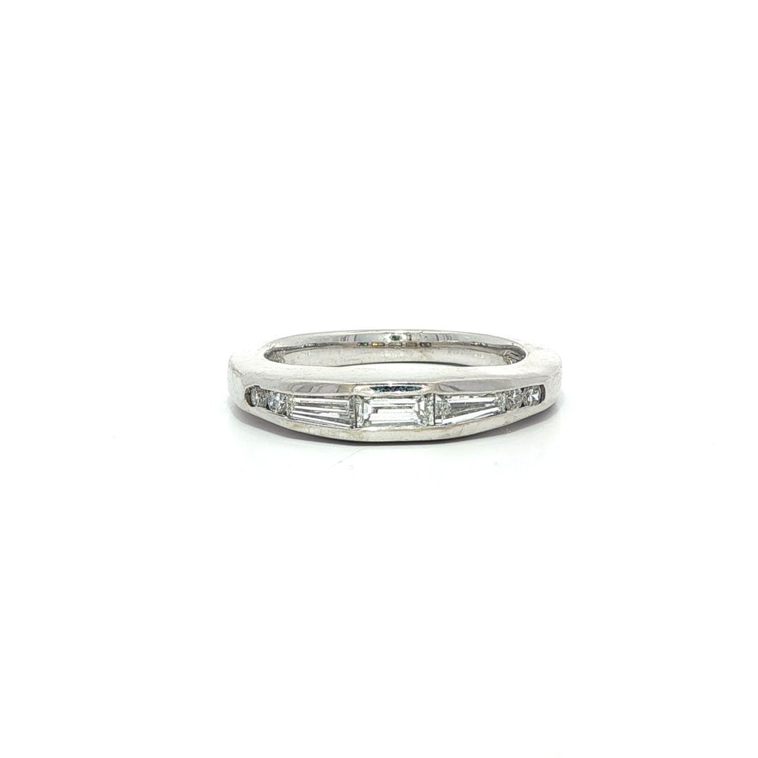 Vintage 14k White Gold 0.45ct Unique Channel Set Diamond Band Ring: Vintage 14k White Gold 0.45ct Unique Channel Set Diamond Band Ring This exquisite vintage band ring features a unique design crafted from solid 14k white gold. It showcases a stunning array of seven n