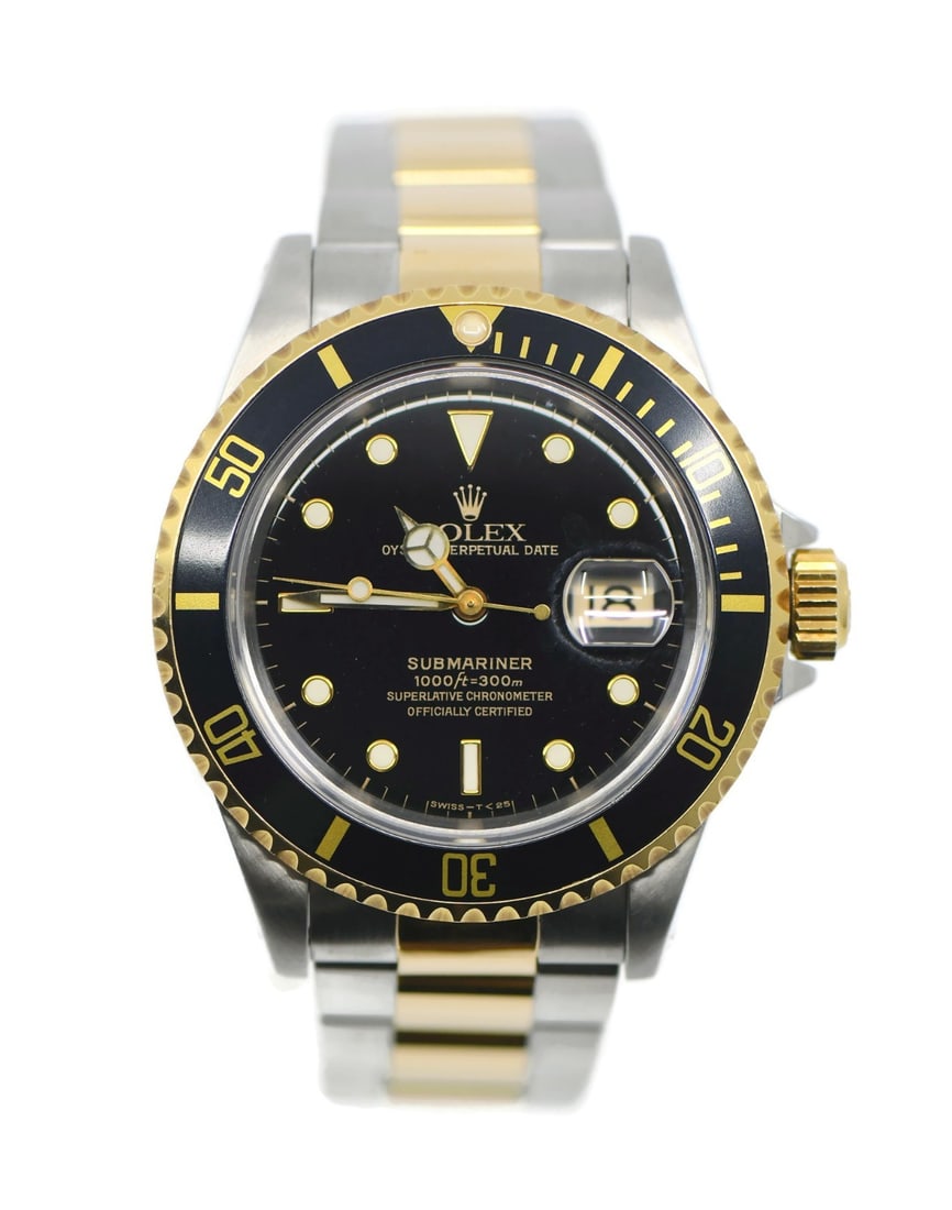 Rolex 16613 Submariner men's wristwatch in 18K and stainless steel: Rolex 16613 Submariner men's wristwatch in 18K and stainless steel Pre-owned Rolex Submariner wristwatch with automatic movement, black dial, and a unidirectional rotating bezel. This men's watch feat