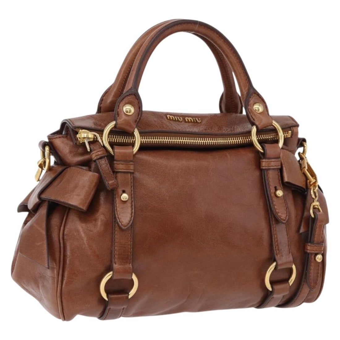Miu Miu Brown Leather 2way Handbag with Shoulder Strap Dust Bag: Miu Miu Brown Leather 2way Handbag with Shoulder Strap Dust Bag Brown leather 2-way handbag with gold-tone hardware, made in Italy. It comes with a dust bag and shoulder strap. The bag is in AB Very G