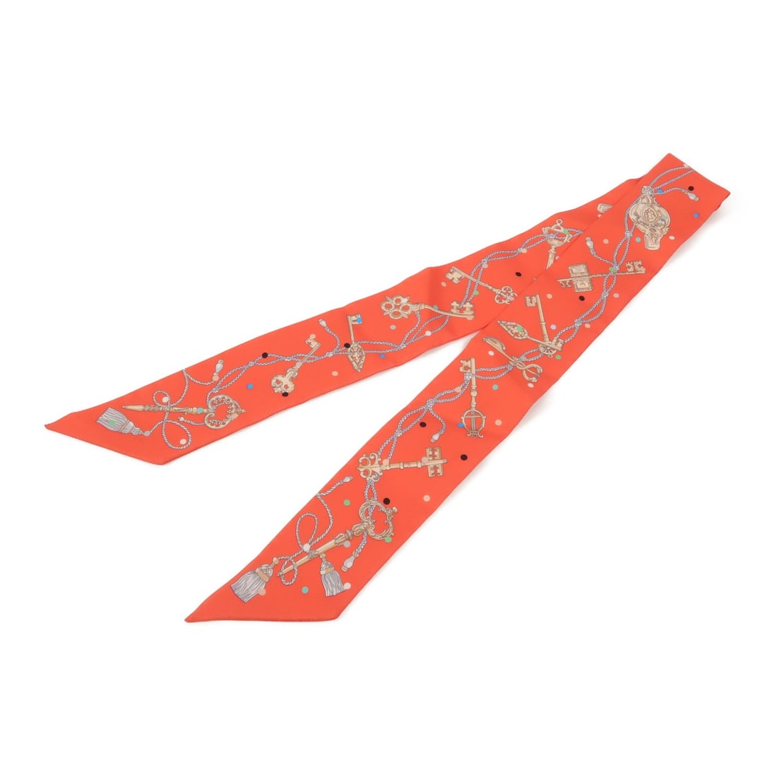 Hermes Twilly Silk Scarf Red Multicolor: Hermes Twilly Silk Scarf Red Multicolor Hermes Twilly scarf in silk with a red and multicolor design. The item is in very good AB condition and comes with no accessories. Size is 86 cm x 5 cm (33.9 in