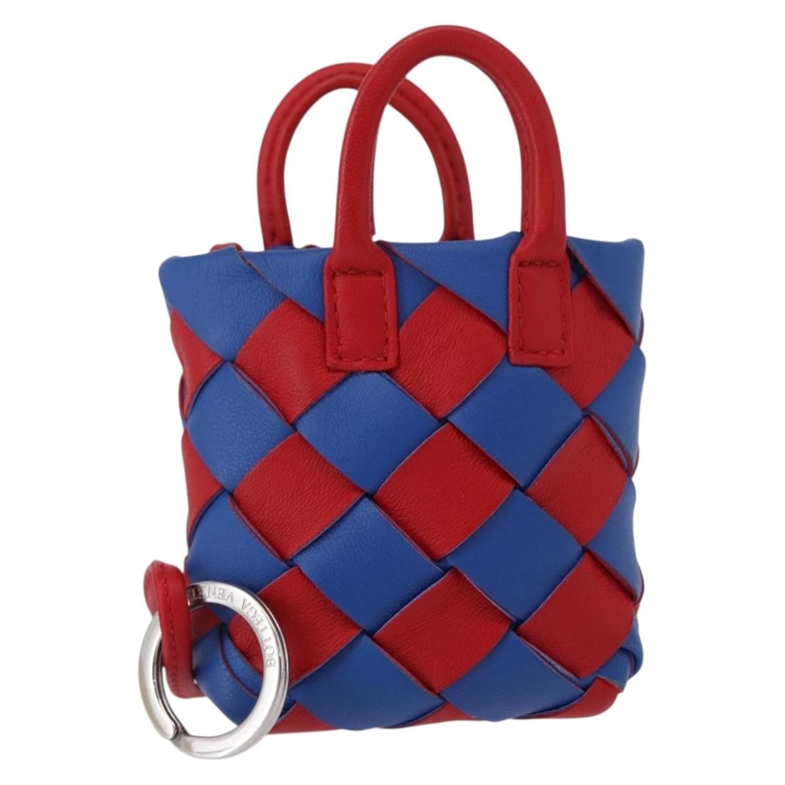 BOTTEGA VENETA Intrecciato Charm Leather Red Blue Italy: BOTTEGA VENETA Intrecciato Charm Leather Red Blue Italy Introducing the exquisite Bottega Veneta Intrecciato Charm, crafted from high-quality leather in a striking red and blue combination. This styli