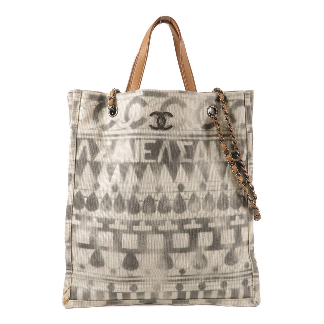 CHANEL A91746 Iliad CC Canvas 2 Way Shopping Tote Beige: CHANEL A91746 Iliad CC Canvas 2 Way Shopping Tote Beige CHANEL CC Iliad Shopping Tote 2 Way Shoulder Bag in beige canvas. This tote features a 2-way carry design with a handle and shoulder strap, plus