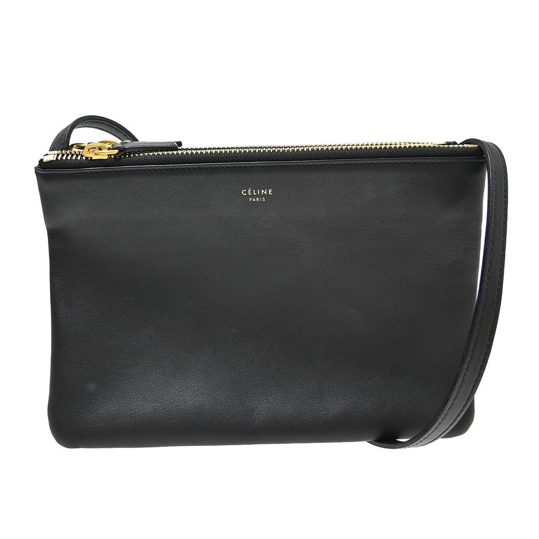CELINE Trio Medium Black Leather Shoulder Bag Italy: CELINE Trio Medium Black Leather Shoulder Bag Italy Celine Trio shoulder bag in black leather, made in Italy. It features a shoulder strap, logo accent, and a black exterior with black lining. The bag