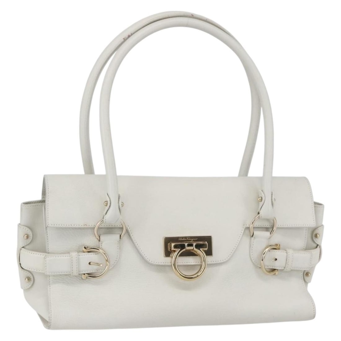 Salvatore Ferragamo Gancini white gold leather shoulder bag: Salvatore Ferragamo Gancini white gold leather shoulder bag This Salvatore Ferragamo Gancini shoulder bag features a white and gold leather exterior with gold-tone accents. Made in Italy, the bag offe