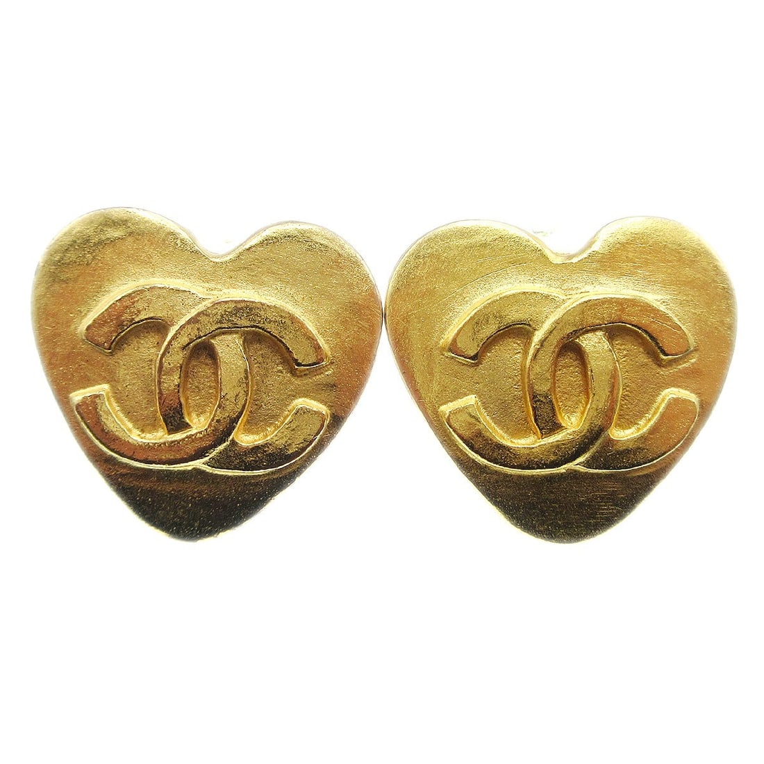 CHANEL 95P Gold Plated Heart Clip-On Earrings: CHANEL 95P Gold Plated Heart Clip-On Earrings Pair of Chanel heart motif clip-on earrings in gold-plated metal. These button-style earrings feature a heart shape and are marked 95P. Made in France. Co