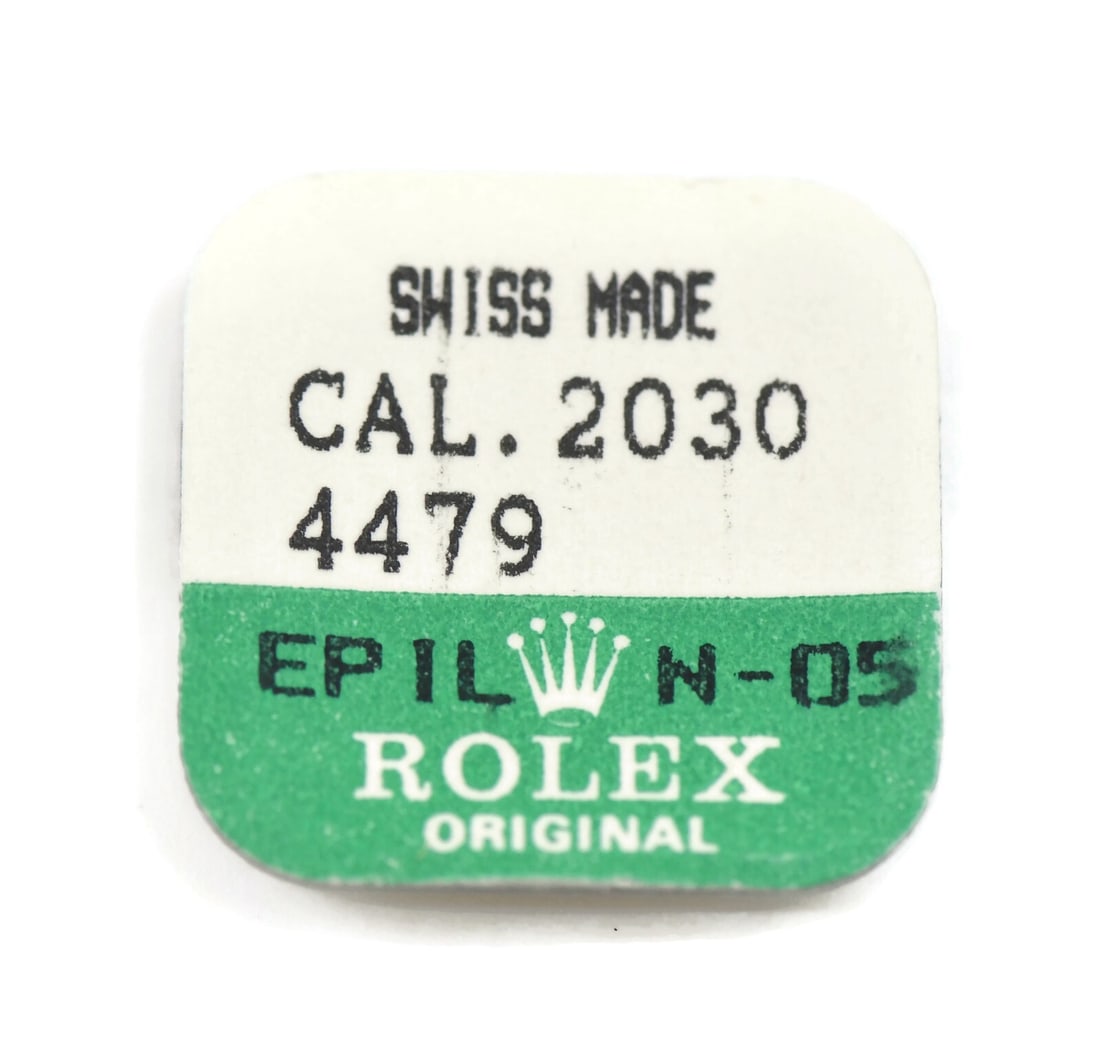 Rolex Reversing Wheel Caliber 2030-4479 Movement Part: Rolex Reversing Wheel Caliber 2030-4479 Movement Part This is a pre-owned Rolex Reversing Wheel compatible with the Rolex Caliber 2030-4479. It serves as a crucial movement part for maintaining the fu