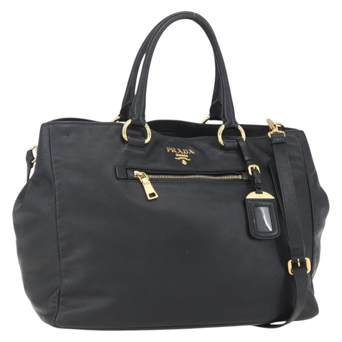 PRADA Black Leather 2 Way Hand Bag with Shoulder Strap: PRADA Black Leather 2 Way Hand Bag with Shoulder Strap Prada 2way handbag in black and gold leather, made in Italy. It comes with a dust bag, name tag, and shoulder strap. The bag is described as havi