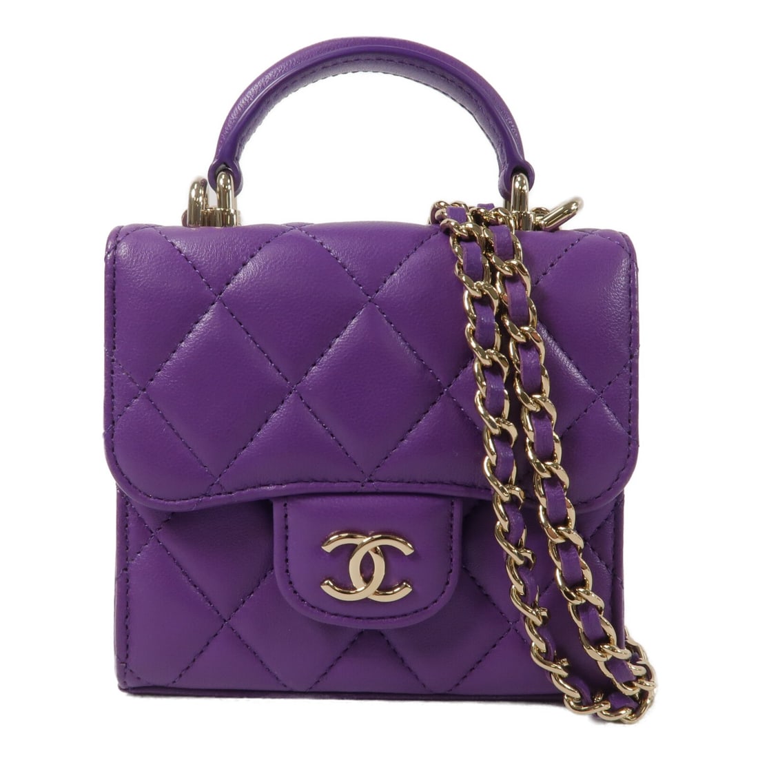 CHANEL Mini Flap Top Handle Chain Shoulder Bag Purple Lambskin: CHANEL Mini Flap Top Handle Chain Shoulder Bag Purple Lambskin Mini top handle flap chain shoulder bag in purple lambskin leather with gold-tone hardware. It features a magnetic pocket and four open i