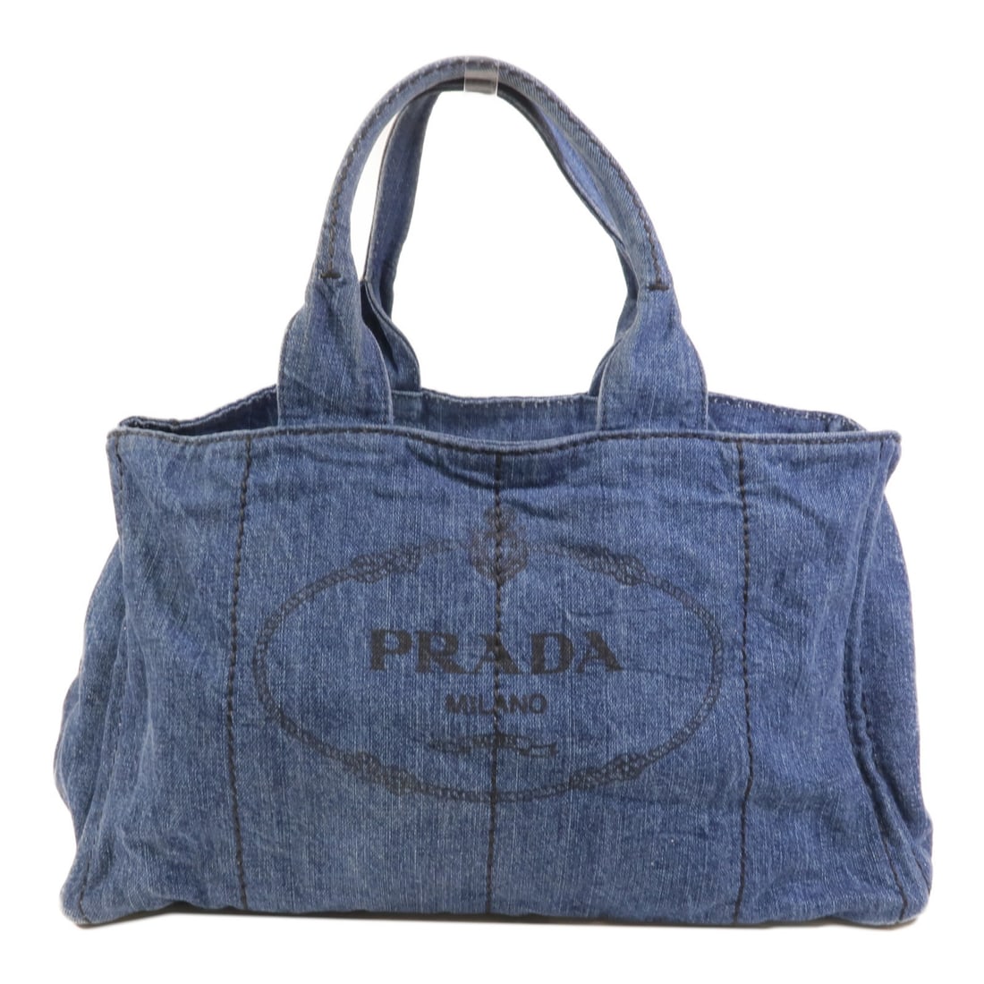 PRADA Canapa Large Denim Tote Bag Blue GHW: PRADA Canapa Large Denim Tote Bag Blue GHW A large denim tote bag in blue from the Canapa line, featuring a spacious open-top design with dual handles and multiple interior pockets. The item is descri