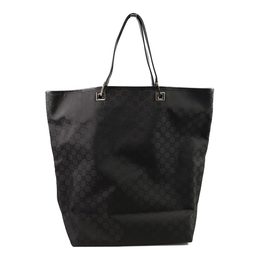 Gucci 269123 GG Nylon Tote Handbag in Black: Gucci 269123 GG Nylon Tote Handbag in Black A GUCCI GG tote bag in black, made from nylon. This model is identified as 269123 and is presented in very good AB condition. It features one inside zip poc