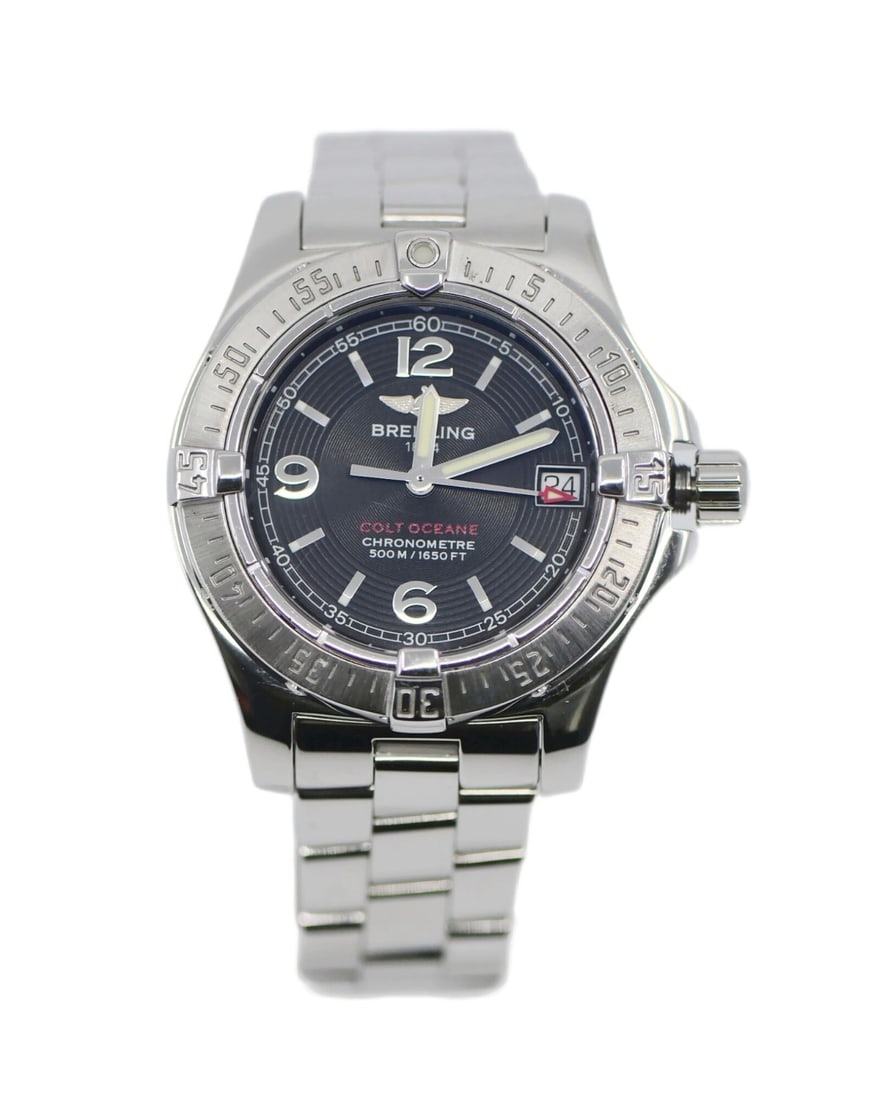Breitling Colt Ocean Quartz Ladies Steel Bracelet Watch A77380: Breitling Colt Ocean Quartz Ladies Steel Bracelet Watch A77380 This Breitling Colt Ocean wristwatch features a stainless steel case and bracelet with a polished finish. It has a 33mm round case, a sil