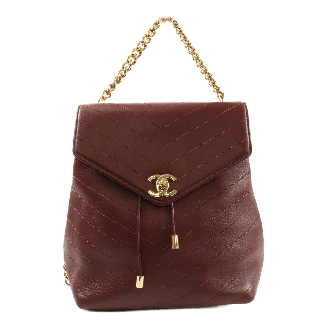 CHANEL CC Chain Backpack Red Calfskin Leather GHW: CHANEL CC Chain Backpack Red Calfskin Leather GHW A CHANEL CC chain backpack in red calfskin leather with gold-tone hardware. It features a turn-lock closure, one inside zip pocket, and comes with sto