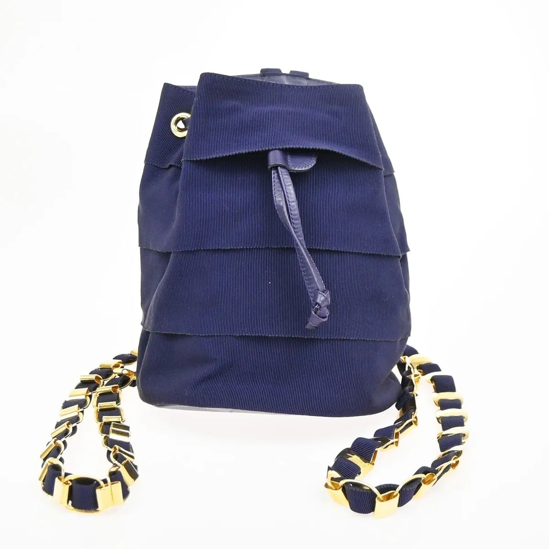 Salvatore Ferragamo Vara Chain Purple Canvas Backpack: Salvatore Ferragamo Vara Chain Purple Canvas Backpack This Salvatore Ferragamo Vara Chain Backpack features a purple canvas exterior and is designed for women. Crafted in Italy, the backpack showcases
