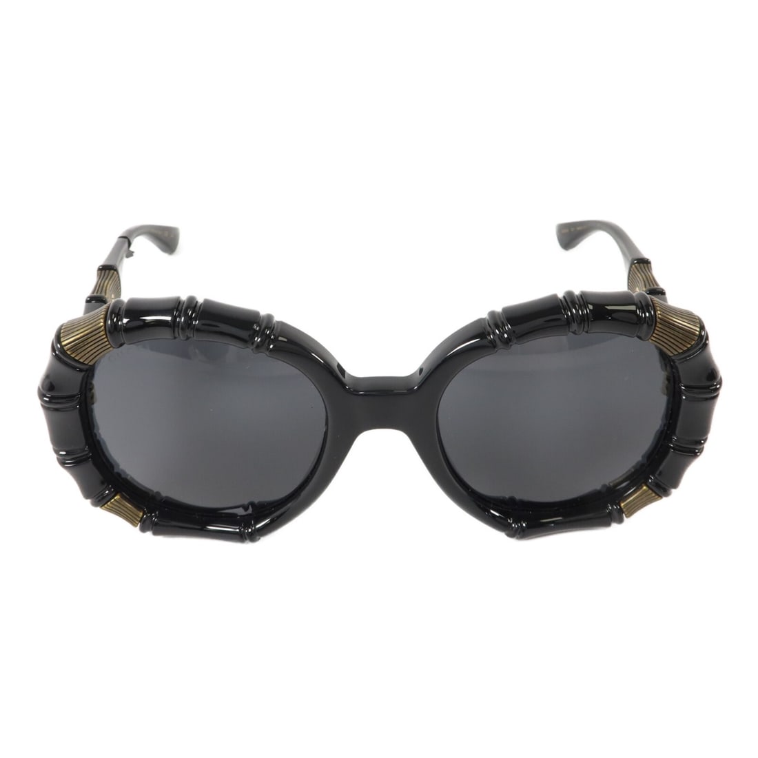 GUCCI GG0659S 001 Black PVC Women's Sunglasses: GUCCI GG0659S 001 Black PVC Women's Sunglasses GUCCI GG sunglasses model GG0659S 001 in black PVC, designed for women. The frame and color are black, and the item is made in Italy. Condition is AB: Ve